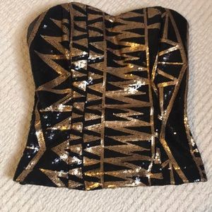 Black and gold sequined strapless top
